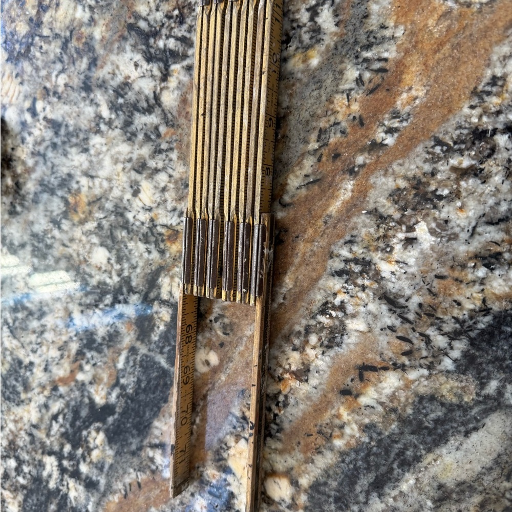 Antique measuring stick
